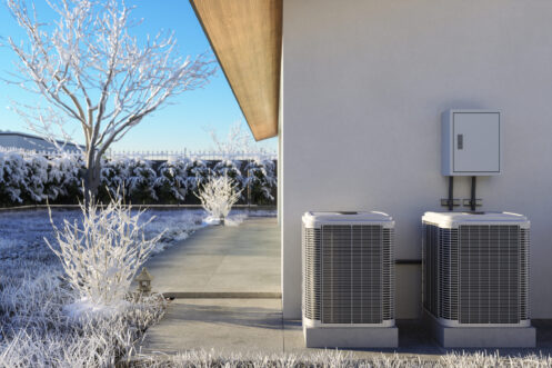 Heat pump on a cold, snowy morning